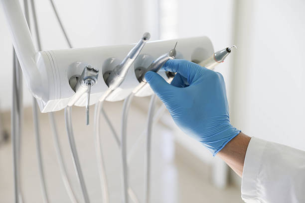 Professional Tooth Extraction technician working in Lake Jackson, TX